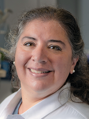 Dr. Genel Giuliano, general dentist and implantologist at the New Milford office